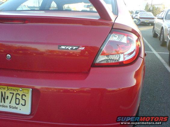 Red 2005 Dodge SRT-4 rear view, showing SRT-4 badge and New Jersey license plate