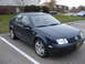 2002 Volkswagen Jetta - This dark blue 2002 Volkswagen Jetta sedan is parked in an outdoor lot.