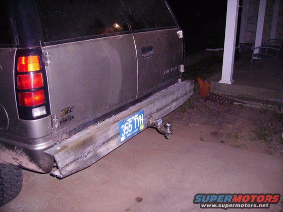 Rear of a 2000 Chevrolet Tahoe with a custom metal bumper and trailer hitch. Michigan license plate 355 TYH is visible