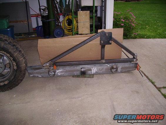 Custom rear bumper with tire carrier mount