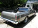 1972 Ford Ranchero - The rear of a 1972 Ford Ranchero shows its bed and chrome bumper.