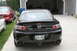 2006 Mazda Miata - Rear view of a black Mazda RX-8, identified by its RX-8 badge and a 2007 Tennessee license plate.