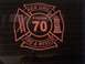 1989 Ford Bronco - Decal for Ken Grill Station 70 Fire & Rescue is applied to a dark surface, possibly a vehicle window.