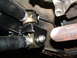 1994 Jeep YJ - Close-up of a suspension component, likely part of an aftermarket upgrade. Supermotors.net logo is visible.