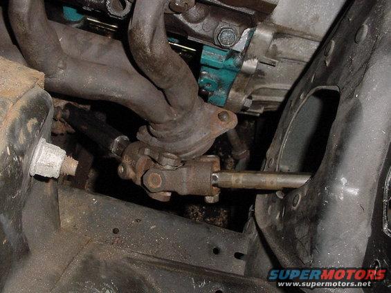 We had to move the steering arm to clear the Exaust Minfolds using Stock parts. We used 2 steering columns, Think we go it. Just need a Firewall mount now.