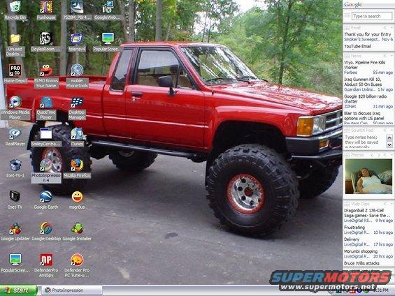 Red lifted pickup truck with large off-road tires
