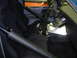 1997 Ford Ranger - Custom interior of a truck features racing seats, a roll cage, and a prominent metal box on the center console.