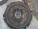 1990 Ford Bronco - A worn clutch assembly is shown, with frayed material visible in the center.