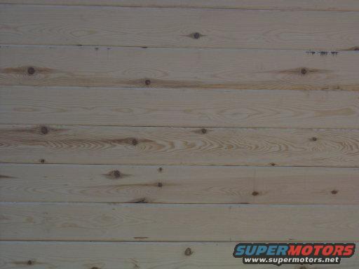 Wood paneling with SUPERMOTORS.NET watermark