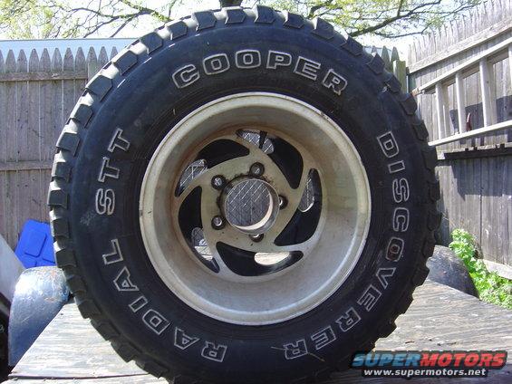 Cooper Discoverer radial tire on a silver alloy wheel
