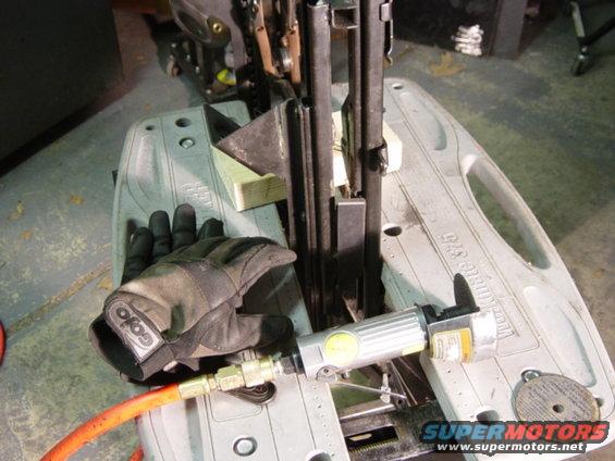 dsc00548.jpg The driver's seat was a bolt in with the original Bronco slider (well, once you measure and drill four boltholes in the floorpan).  The passenger's seat was not -- outboard holes go in the same place, but neither of the inboard feet will work as-is.  Here's how you fix that.  :)