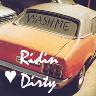 Rear of a dirty orange car with a white roof. 'WASH ME' is written on the back window