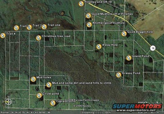 Satellite map showing trails, mudholes, and ponds in a rural area, with labels like 'Trail 4', 'Christmas tree road', and 'Island Pond'