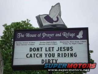 Sign with text 'DONT LET JESUS CATCH YOU RIDING DIRTY'
