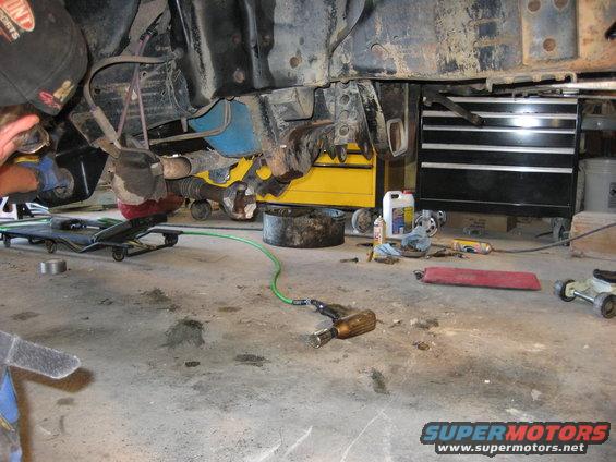 under the truck with the front end out