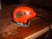 1988 Ford Bronco - A Black & Decker Mouse sander rests on a wooden surface, possibly in the process of refinishing.