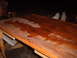 1988 Ford Bronco - Tabletop shows damage from water exposure, with finish lifting in patches.