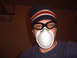1988 Ford Bronco - A person is shown wearing a dust mask and protective goggles, possibly for a refinishing project.