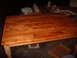 1988 Ford Bronco - A wooden table with a butcher block top is shown, with finishing supplies in the background.