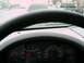 1997 Ford F-150 - Interior view of a truck's dashboard with a road and other vehicles visible through the windshield.