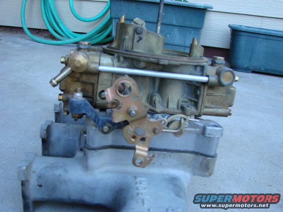 Holley carburetor mounted on an aluminum intake manifold