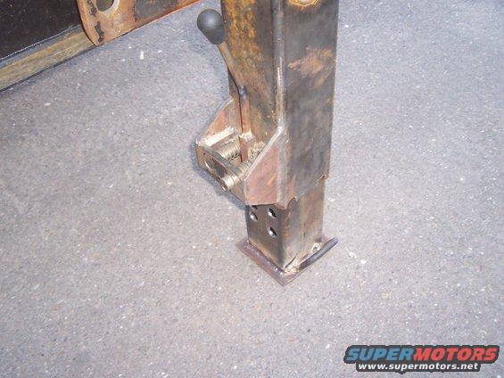 rear support jack's "drop leg" dropped down to ground
