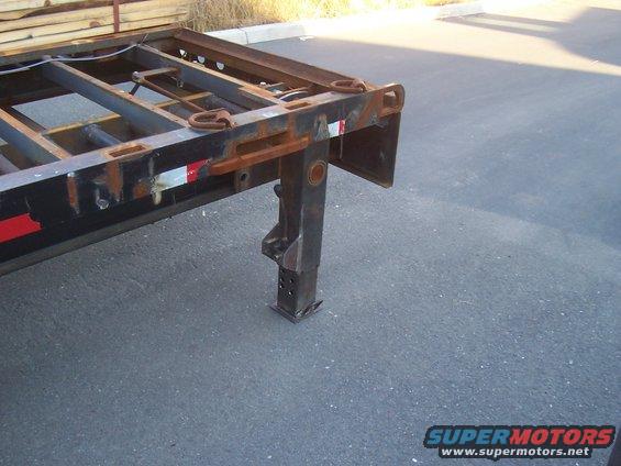 rear support jack dropped down to the ground, and locked in place