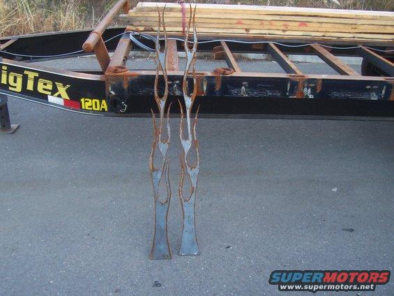 These flames don't serve any purpose other than to look cool. I cut them out of 1/4" steel plate, and was going to weld them on to the trailer deck frame.
They go with trailer