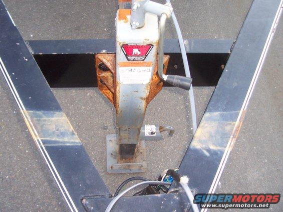Bulldog 12,000 pound jack, bolted (not welded) to 8" C-channel crossmember in tounge