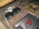 1979 Ford Bronco - Car audio components including an Orion amplifier and two crossovers are installed on the vehicle's carpeted floor.