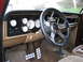 1979 Ford Bronco - Custom gauges and steering wheel in a 1979 Ford Bronco interior.