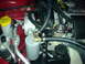 2005 Dodge SRT-4 - Close-up view of an engine bay, showing various components and hoses.