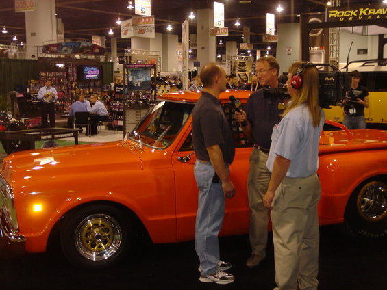 dsc00146.jpg Doc Riley at SEMA, interviewing Chris Calkins for Inside Drag Racing.