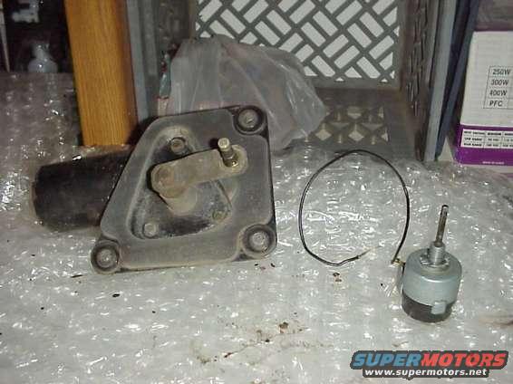 Windshield wiper motor assembly and a separate electrical switch with a wire loop
