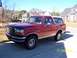 1994 Ford Bronco - This 1994 Ford Bronco has a two-tone paint scheme with a tan lower body trim and a removable hardtop.