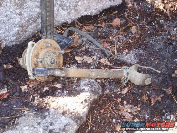 Driveshaft U-joint and axle shaft with hub assembly on the ground