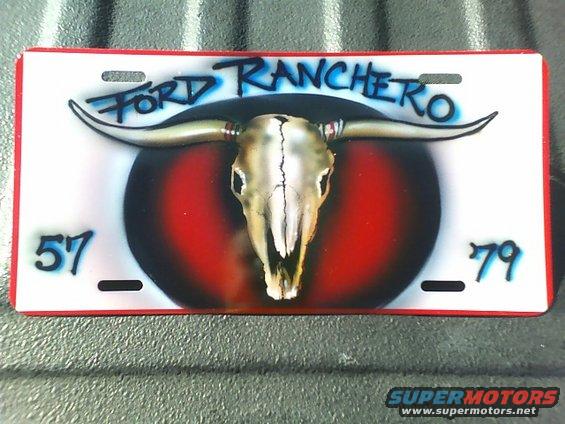 License plate with "FORD RANCHERO" text, a bull skull, and "57" and "79" numbers