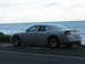 2006 Dodge Charger - A silver 2006 Dodge Charger is parked on the side of a road with the ocean in the background.