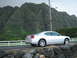 2006 Dodge Charger - A silver 2006 Dodge Charger is parked by the side of a road with a mountainous backdrop.