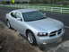 2006 Dodge Charger - This silver 2006 Dodge Charger is parked on the side of a road.