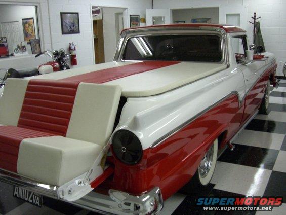1957 Ford Ranchero with custom red and white seating in bed