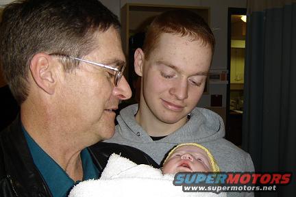 keira-8.jpg Keira just born with Grandpa and Daddy