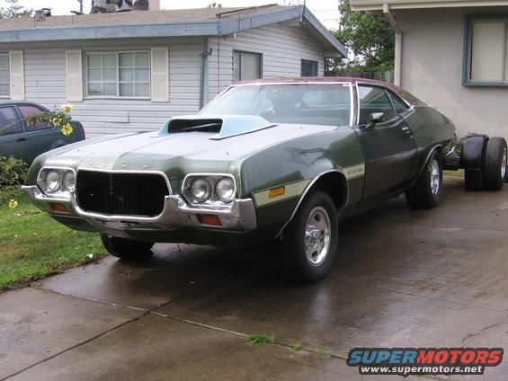 Green 1972 Ford Ranchero, 3q-front view, hood scoop, dual rear wheels