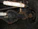 1992 Ford Mustang - The photo shows the underside of a vehicle, focusing on the rear axle and suspension components.