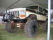 1992 Ford Mustang - This modified Ford Bronco features a lifted suspension and aggressive off-road tires.