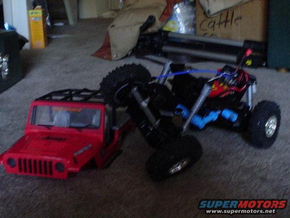RC Jeep body and chassis on carpet
