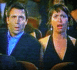 1996 Ford Probe - A man and woman in a theater audience react with surprise to something happening on stage.