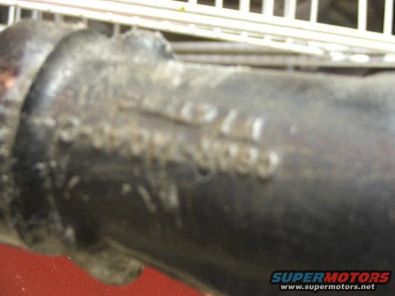 Part with embossed text C-40-242-31093