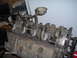 1978 Ford Bronco - This is a close-up view of an engine block assembly, showing the crankshaft and oil pickup.