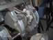 1978 Ford Bronco - Close-up view of an engine's crankshaft and connecting rod assembly, showing internal mechanical components.
